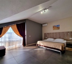 Семейный Мансардный номер FAMILY-M (с балконом) в Heliopark Aqua Resort