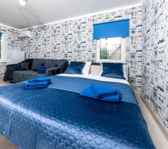 Четырехместный Стандартный номер с Балконом в гостевом доме SV на 3 этаже в Милка