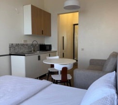 Уютная студия на 13 этаже с панорамным видом на Каспийское море. в Как Дома 05