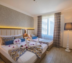 Семейный люкс в Club Big Blue Suit Hotel