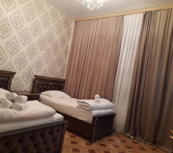 Стандартный номер с 1 двуспальной и 1 односпальной кроватями в За рулем Юг