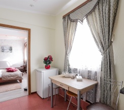 Студия-улучшенный семейный номер в Олимпия