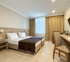 "Стандарт" Стандартный трехместный номер с 2 отдельными кроватями и дополнительным местом в Диона