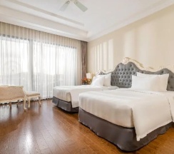 Двухместный номер Deluxe с балконом и с видом на сад 2 отдельные кровати в Отель Wyndham Grand Phu Quoc
