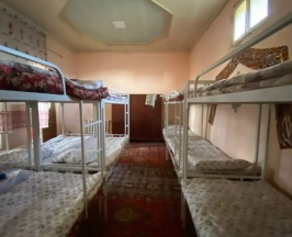 Кровать в общем номере в Гостевой дом Guest House Ozod