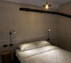 Улучшенные двухуровневые апартаменты с мини-кухней в Loft Apart