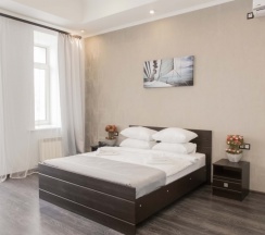 Люкс с балконом и кроватью размера «king-size» в Лофт