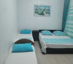 Двухместные семейные апартаменты с 2 комнатами двуспальная кровать в Уютный дворик