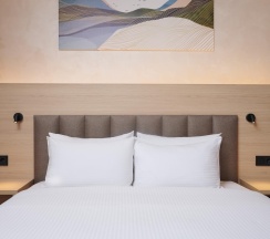 Номер делюкс стандарт в AurA City Hotel