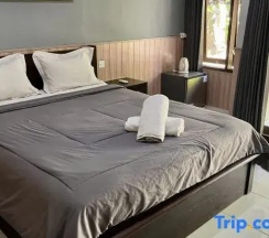 Двухместный номер Standard с видом на сад двуспальная кровать в Mai Guesthouse Sanur