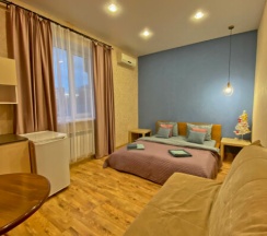 Квартира студия в центре города в Home