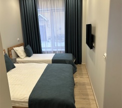 Трехместный с кроватями 160 см и 90 см в Городская гостиница