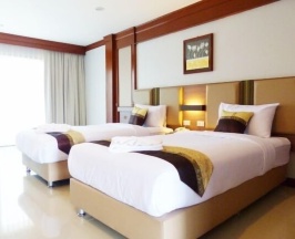 Двухместный номер Deluxe с балконом 2 отдельные кровати в The Impress Nan Hotel