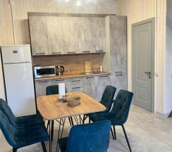 Коттедж с двумя спальнями с видом на море в 4 Сезона