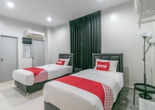 Двухместный номер Standard 2 отдельные кровати в OYO 818 Suksomboon Residence