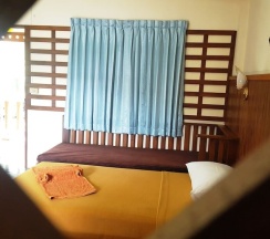 Двухместный номер Standard с балконом двуспальная кровать в Rattana Guesthouse & Bungalow