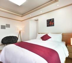 Четырёхместный номер Deluxe двуспальная кровать в Familia Hotel Jeju