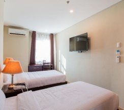 Двухместный номер Standard 2 отдельные кровати в Capital O 461 Asrodel Hotel