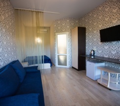 Четырёхместный номер Standard с балконом в Singer