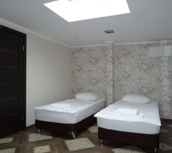 Номер эконом с 2 односпальными кроватями в Лига чемпионов