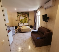 Трёхместный номер Comfort с балконом и с красивым видом из окна в Шато де ля мер