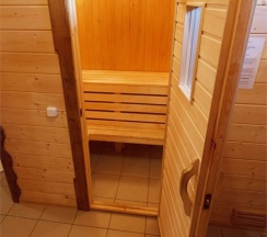 Двухместный номер в деревянном коттедже с сауной и камином в Колыба