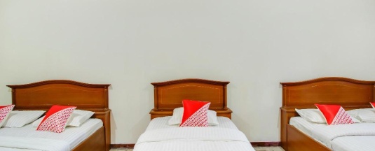 Семейный люкс в OYO 3899 Penginapan Christina