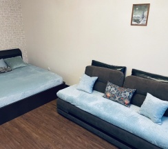 Двухместные апартаменты c 1 комнатой с балконом (двуспальная кровать) в Квартира Уютная на Кургане Бессмертия