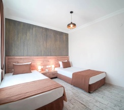 Апартаменты Comfort в Voswos Garage Coffee & Hotel