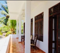 Двухместный номер Standard с видом на море двуспальная кровать в Jasmine Garden Beach Guest House