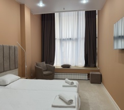 Делюкс в Олимпиада