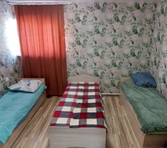 Кровать в общем номере в Алтгост