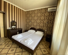 Двухместный номер с двуспальной кроватью в Ахиллес