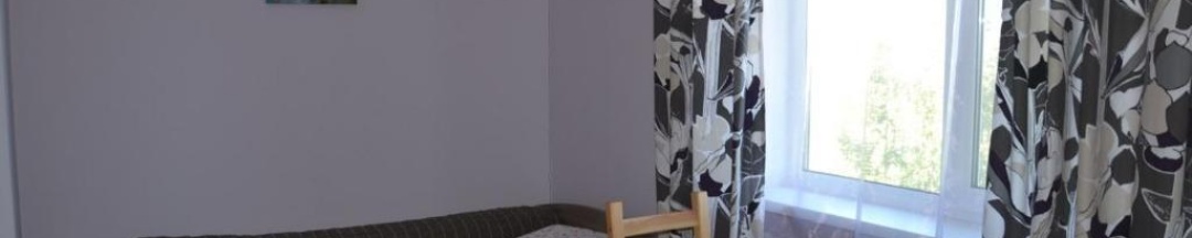 Кровать в 3-местном общем номере в Аврора