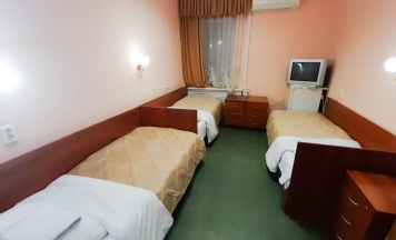 Кровать в 3-местном общем номере в Smart Hotel KDO Белгород