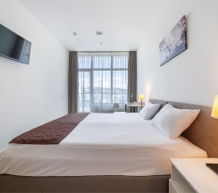 Двухкомнатные апартаменты с одной спальней (6-12 этаж) в Real Apartments Sochi