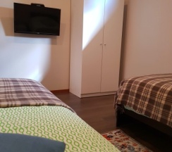 №8 Стандартный номер с 2 односпальными кроватями в Eva Apartments