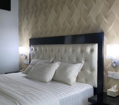Двухместный номер Deluxe двуспальная кровать в Kaliban Hotel