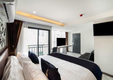 Номер Deluxe в RoomQuest Sukhumvit 36 BTS Thonglor