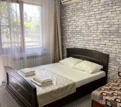 Номер с двуспальной кроватью в Киви