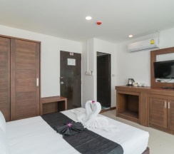 Двухместный номер Deluxe с частичным видом на море двуспальная кровать в Destination Patong