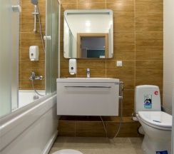 Апартаменты с гостиной и 2 спальнями. Вид на реку Казанку и аквапарк "Ривьера" в Sibgat Apartments