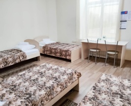 Кровать в 4-местном общем номере в Smart Hotel KDO Саранск