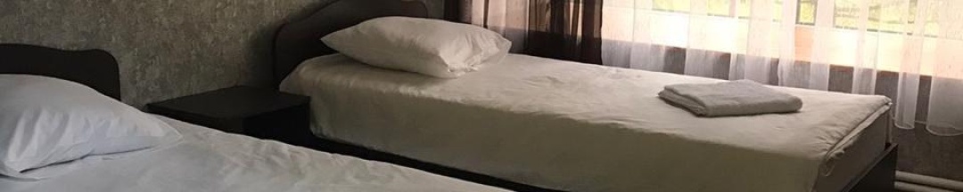 Номер эконом с 2 односпальными кроватями (удобства на этаже) в Постоялый двор