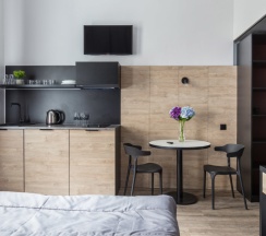 Двухуровневая студия с двумя двуспальными кроватями в Greenfeel Smolensk