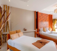 Двухместное бунгало Deluxe с видом на сад двуспальная кровать в Club Bamboo Boutique Patong Beach Resort