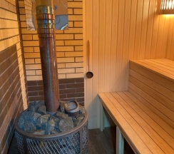 Дом с баней и мангальной зоной в Гостевой дом Фроловых