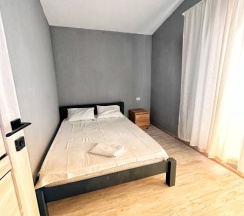 Бунгало с 2 комнатами с балконом и рядом с пляжем в У моря