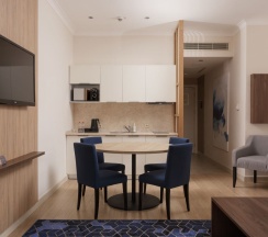 Люкс "Гранд" (Апартамент с 1 спальней) в Кортъярд Марриотт Сочи Красная Поляна