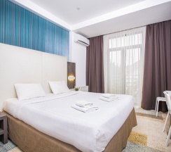 Делюкс с кроватью KING SIZE для 2 гостей в Мио